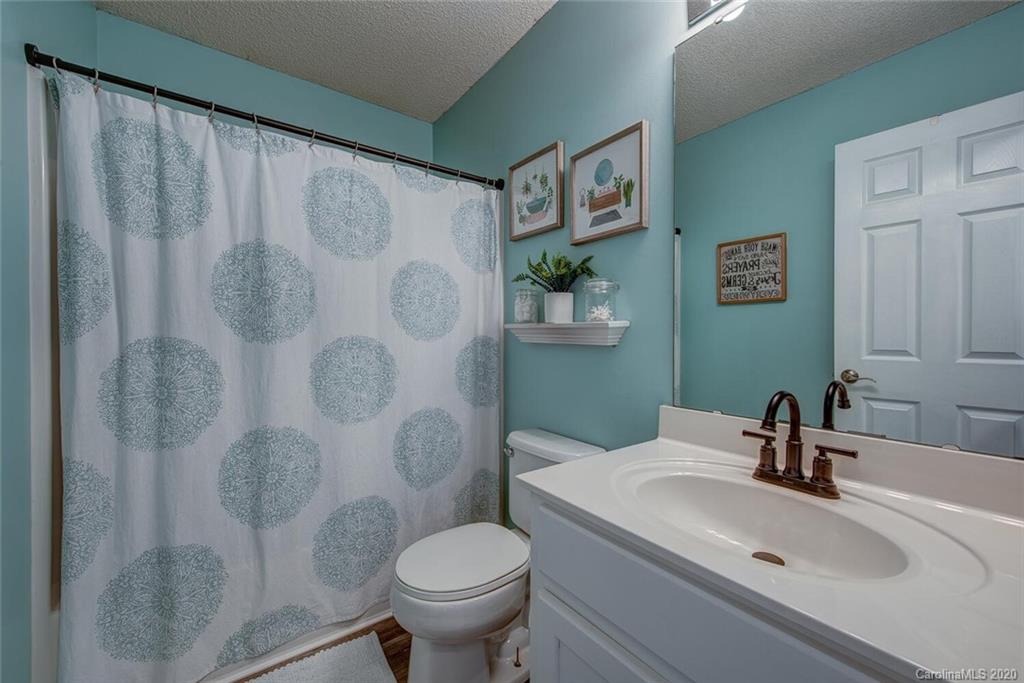 121 Pratt Street Belmont, NC 28012 - Photo 23 of 29 a bathroom with a sink and toilet