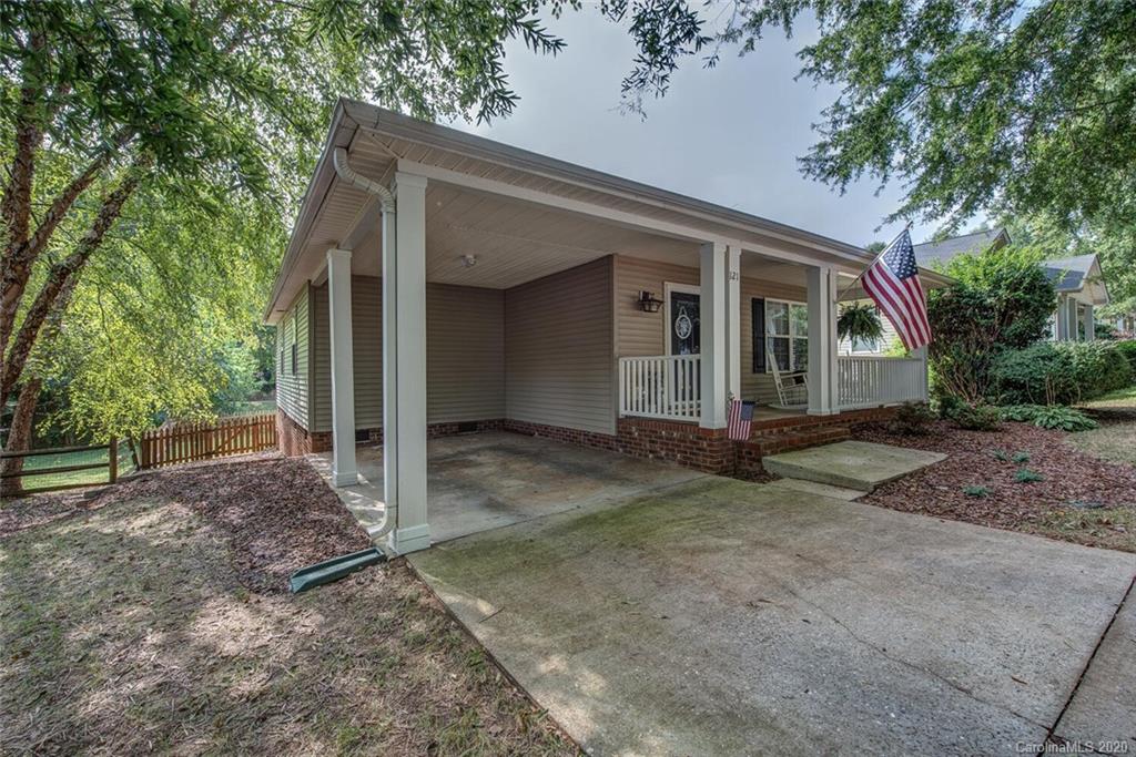 121 Pratt Street Belmont, NC 28012 - Photo 4 of 29 a view of a house with a yard