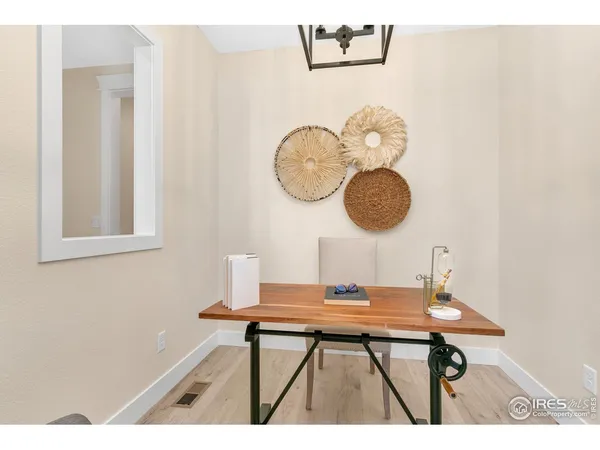 a kitchen with stainless steel appliances granite countertop a refrigerator a sink and a refrigerator