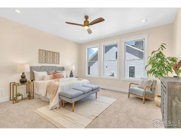 a view of a room that has a table and a chair