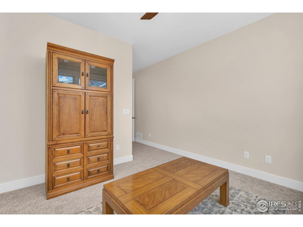 5722 West 3rd Street Greeley, CO 80634 - Photo 18 of 30 Two spacious closets enhance the versatility of the second bedroom