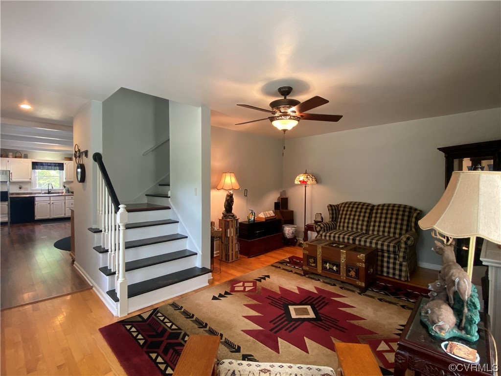 19535 Templeton Road Carson, VA 23830 - Photo 7 of 10 a room with furniture and wooden floor