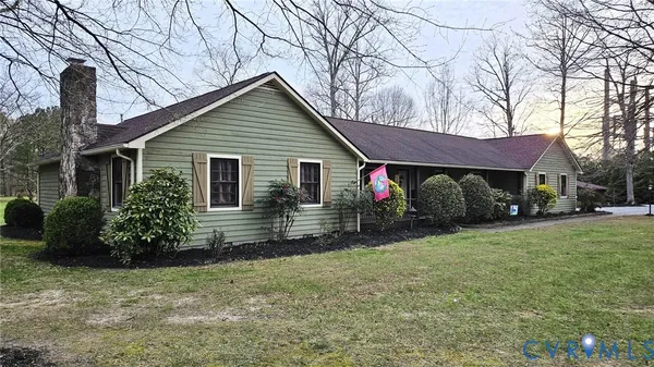 a house with trees in the background