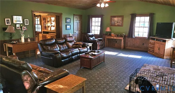 a living room with furniture or couch and a window