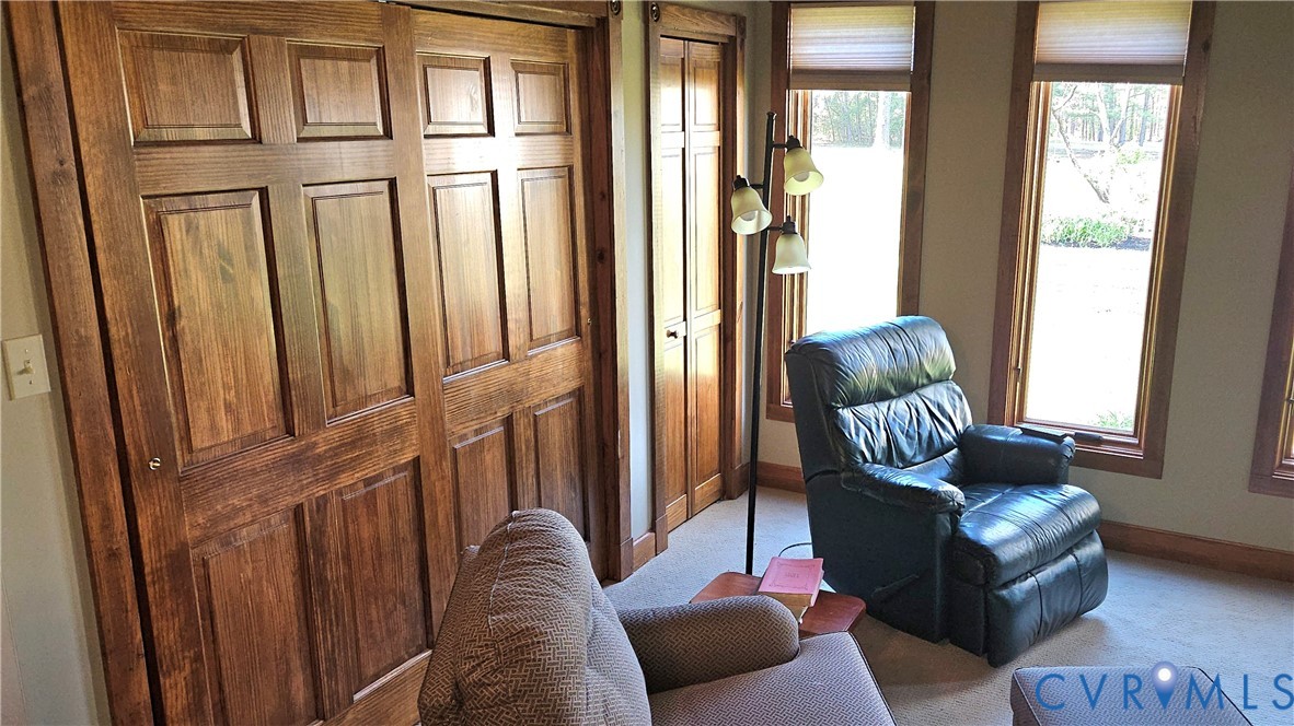 10511 Ashcake Road Ashland, VA 23005 - Photo 30 of 58 a living room with furniture or couch and a window