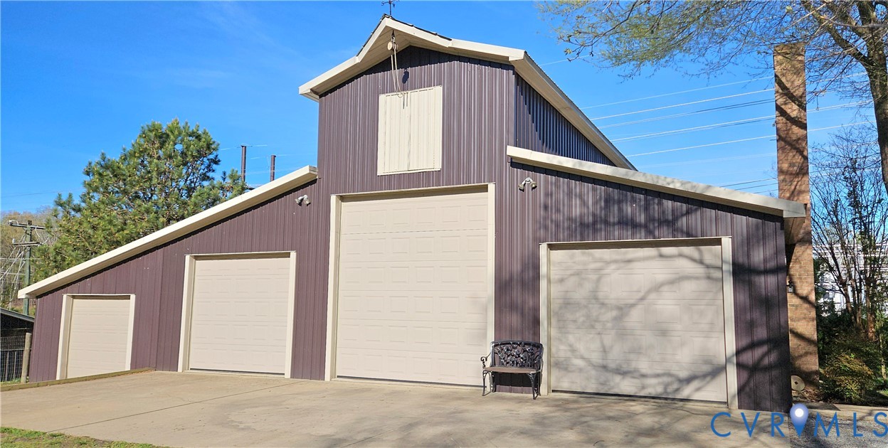10511 Ashcake Road Ashland, VA 23005 - Photo 39 of 58 a house with trees in the background