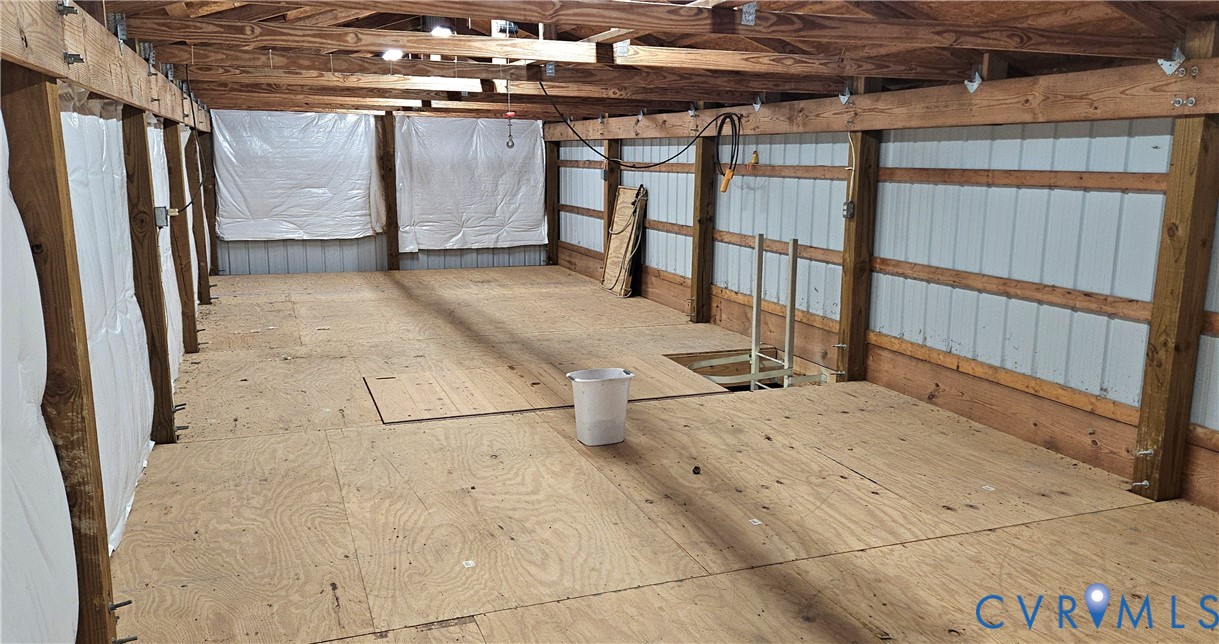 10511 Ashcake Road Ashland, VA 23005 - Photo 48 of 58 a view of a porch with a table and chairs