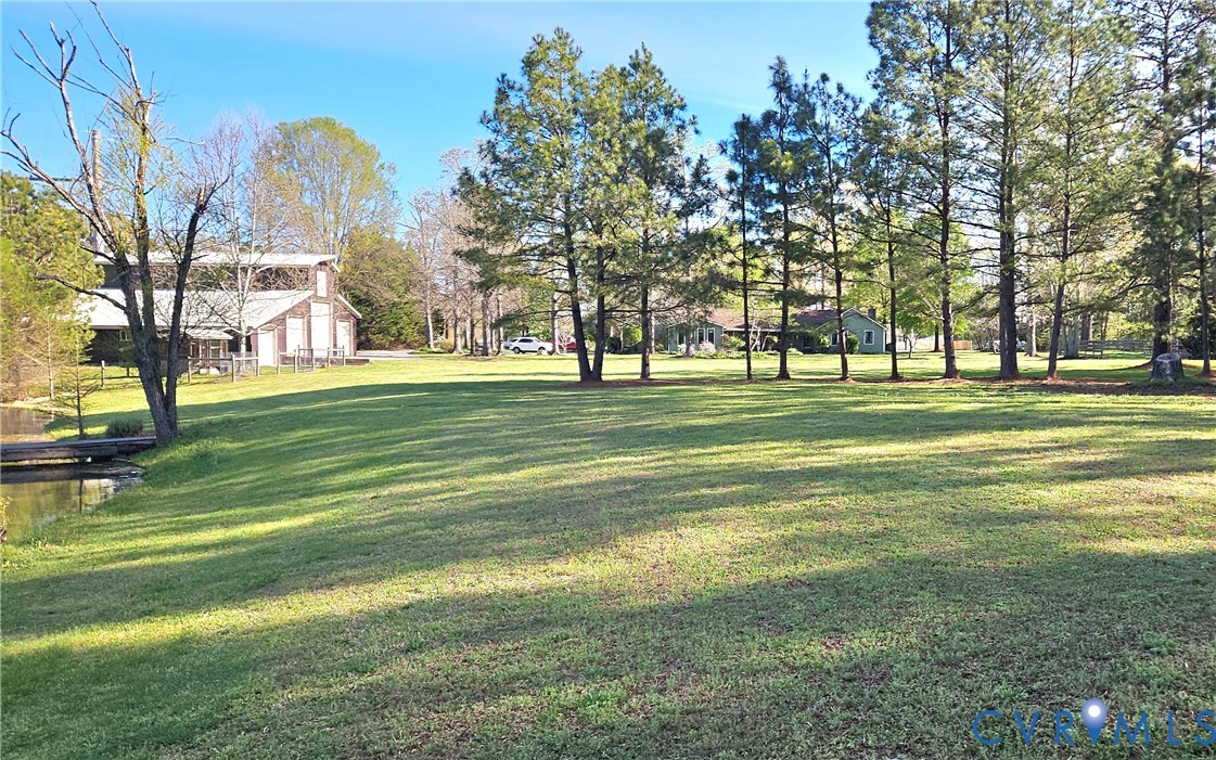 10511 Ashcake Road Ashland, VA 23005 - Photo 53 of 58 a building with trees in the background