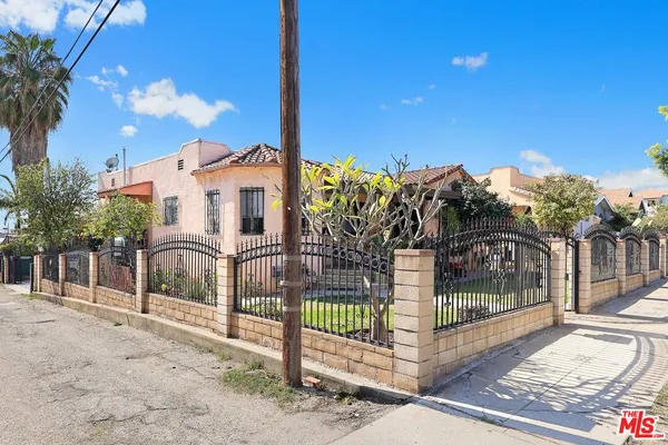 a view of a house with a garden