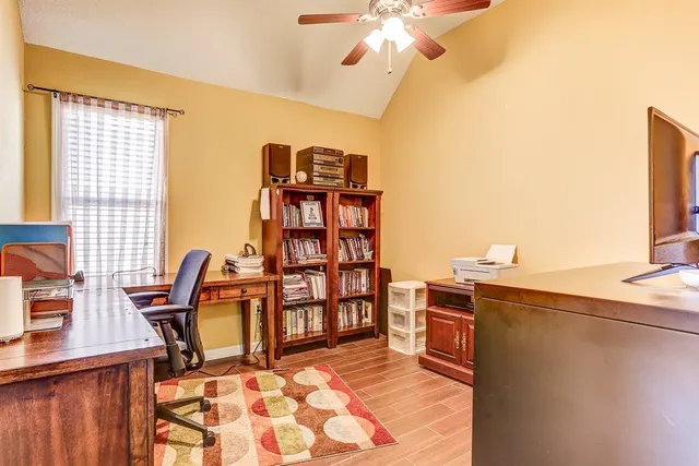 a view of a workspace with furniture