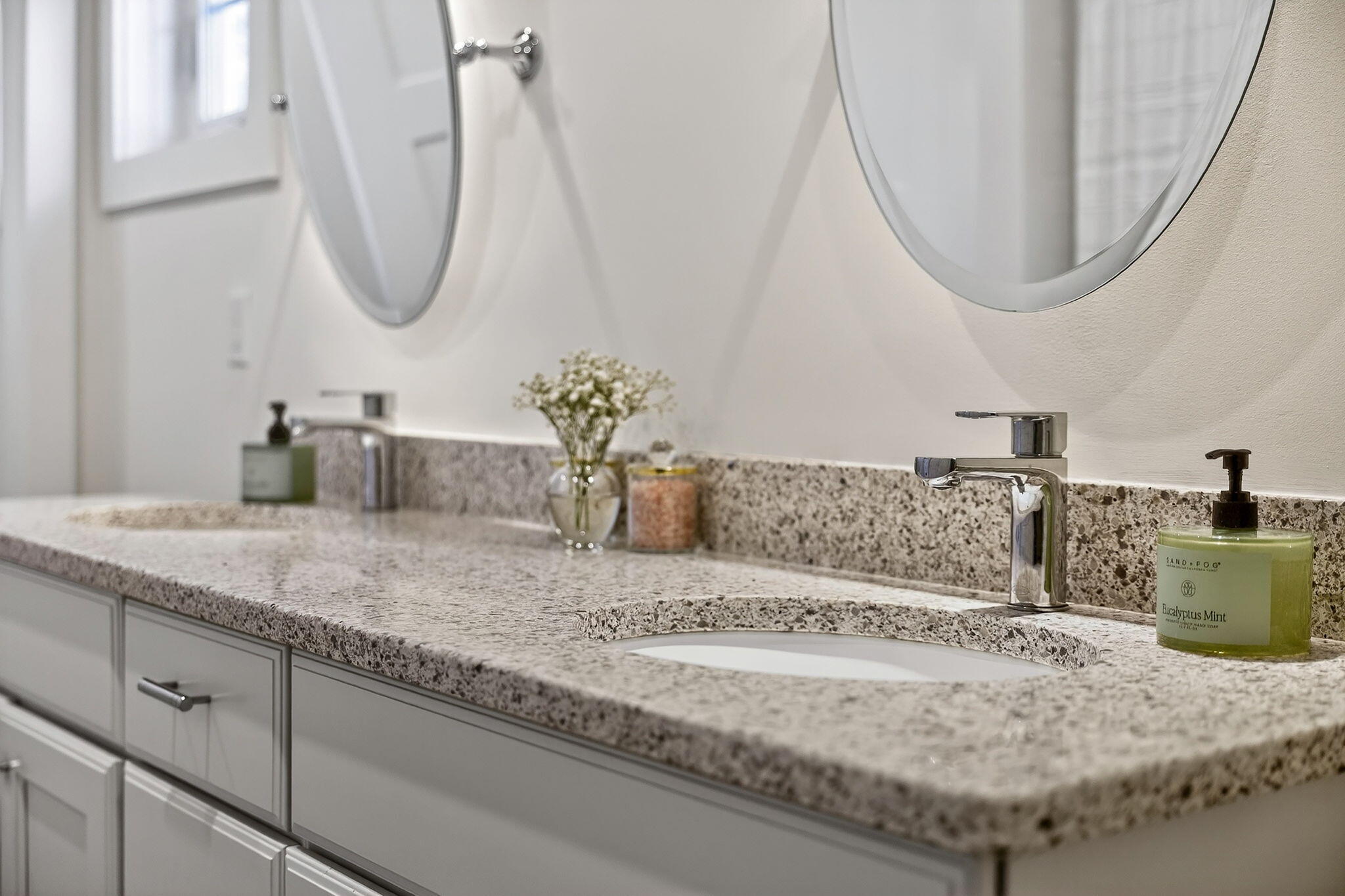 176 Bumps River Road Osterville, MA 02655 - Photo 38 of 54 a bathroom with a granite countertop sink and a mirror