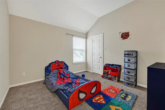 a bedroom with a bed and closet