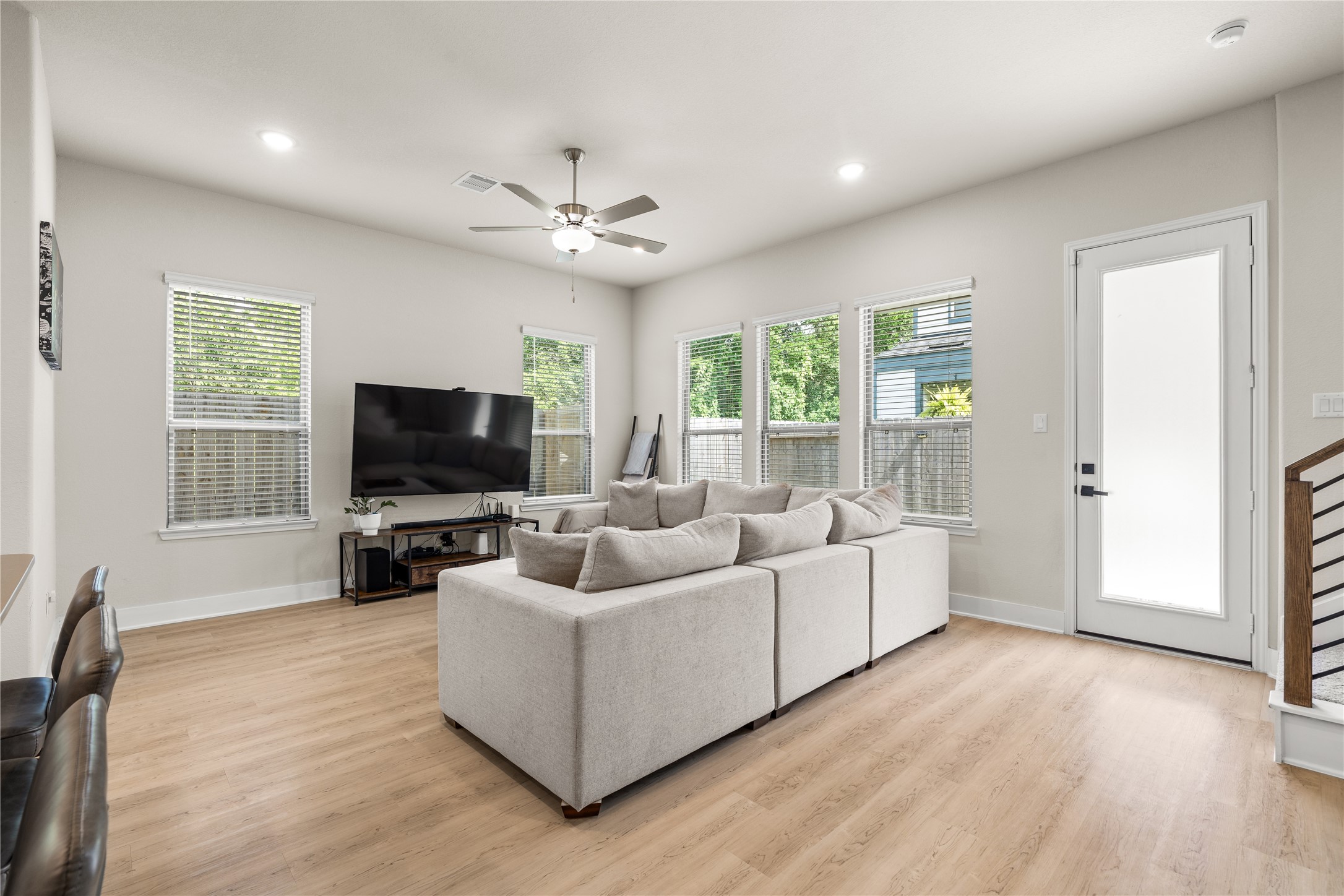 4001 Baja Lane Houston, TX 77045 - Photo 9 of 27 Positioned on a corner lot, the home benefits from additional windows and abundant natural light, creating a living space that feels bright, open, and inviting throughout the day.