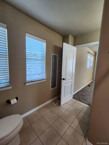 a view of bathroom with a sink toilet and shower