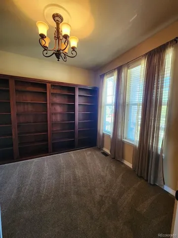 a view of a room with a large window