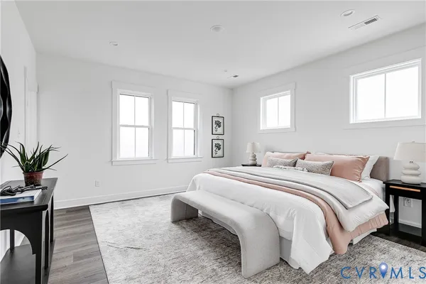 a kitchen with sink a faucet and cabinets