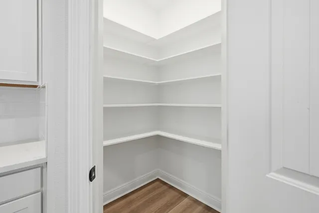 a kitchen with a stove and a microwave