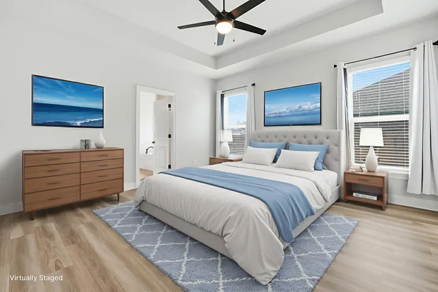 a bathroom with a double vanity sink and mirror