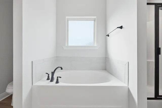 a view of small space with wooden floor