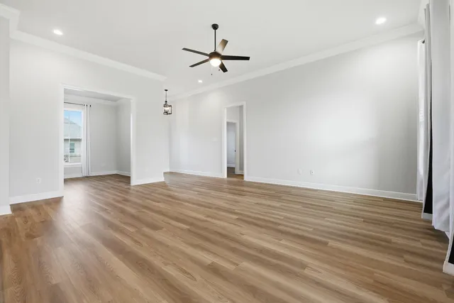 a kitchen with stainless steel appliances a refrigerator stove and microwave