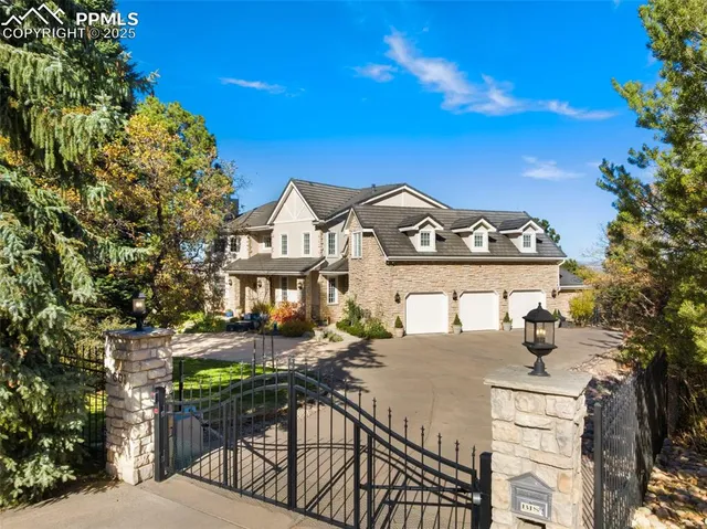 a view of a building with a bench in the patio