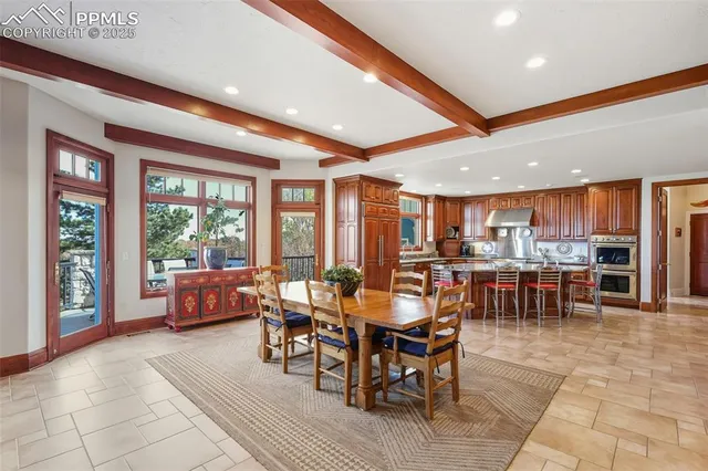 a view of a dining room with furniture window and outside view