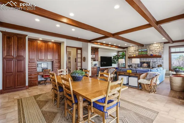 a view of a dining room with furniture window and outside view