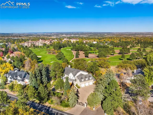 a view of a city with a building in the background