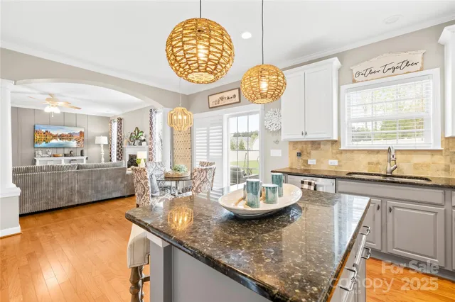 a view of a kitchen and dining table