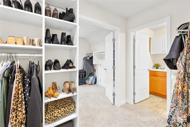 a bathroom with a sink a vanity and a mirror