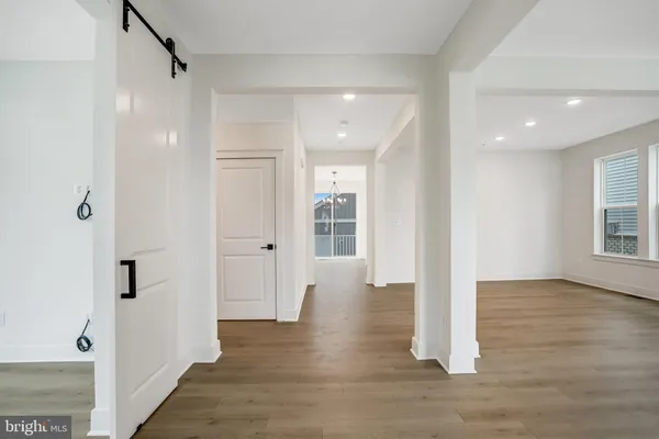 a view of entryway with wooden floor