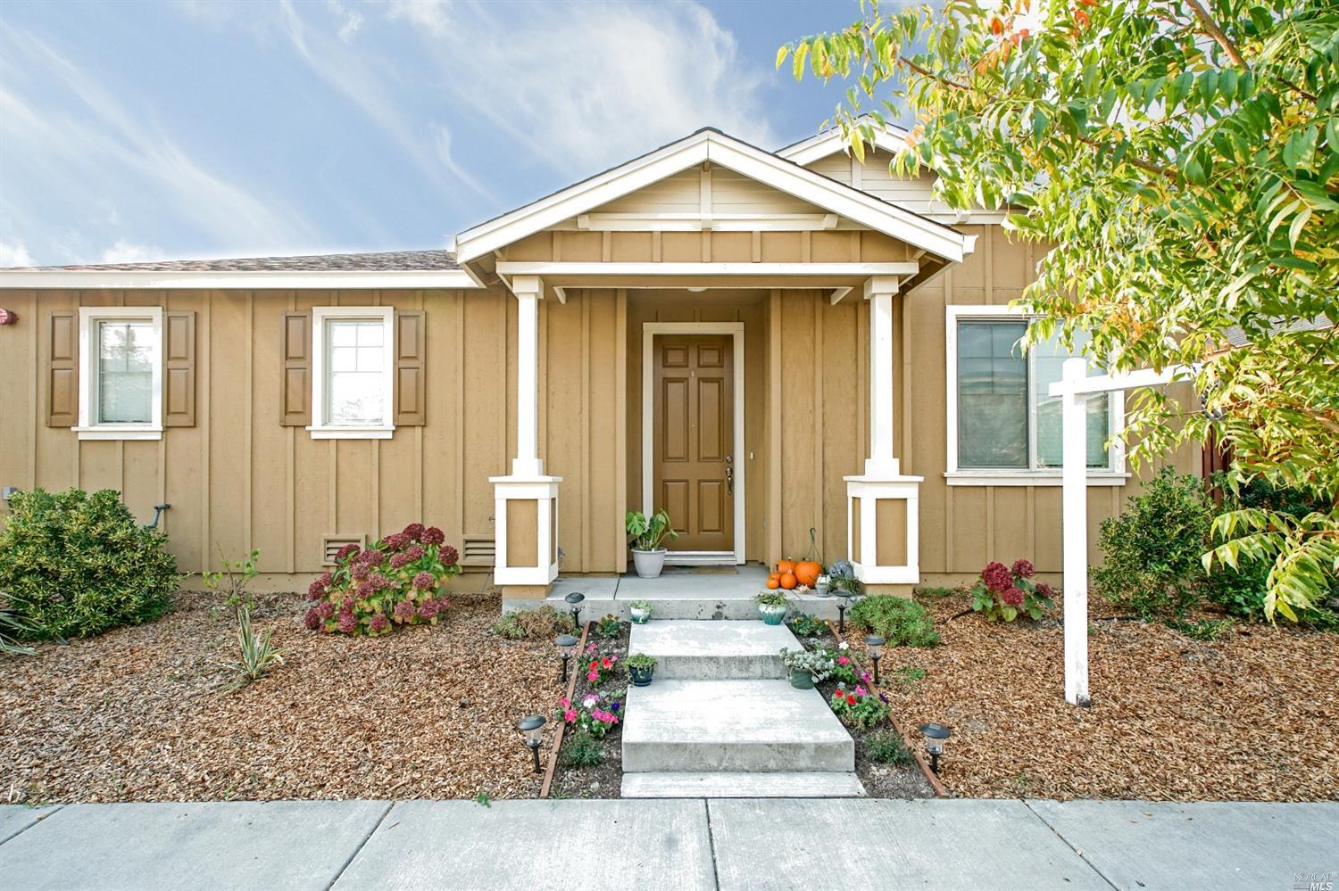 2452 Orleans Street Santa Rosa, CA 95403 - Photo 1 of 1 a front view of a house with garden