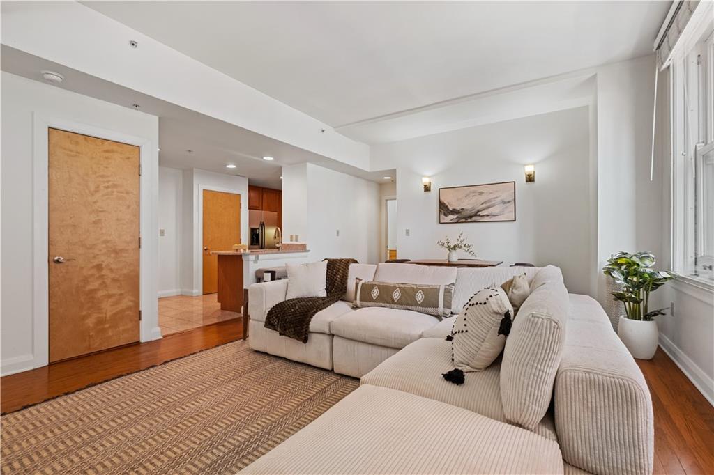306 Fourth Avenue, Unit 501 Pittsburgh, PA 15222 - Photo 17 of 30 a living room with furniture and a rug