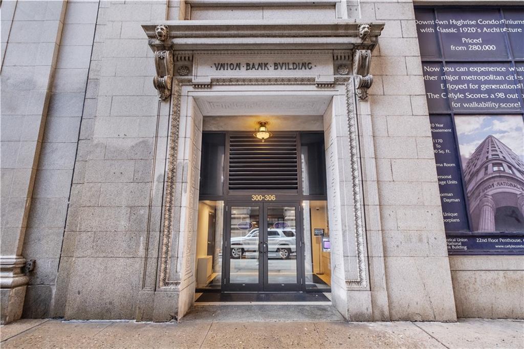 306 Fourth Avenue, Unit 501 Pittsburgh, PA 15222 - Photo 2 of 30 a stove top oven sitting inside of a kitchen