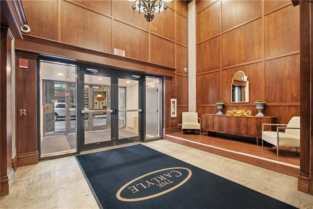 306 Fourth Avenue, Unit 501 Pittsburgh, PA 15222 - Photo 4 of 30 a living room with a couch