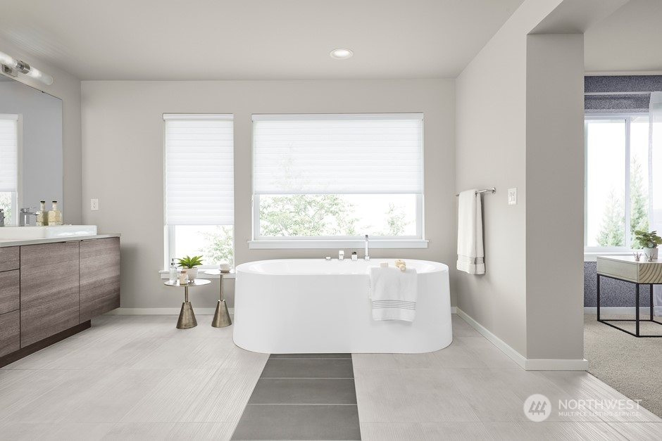 2131 Northeast 14th Place Renton, WA 98056 - Photo 11 of 11 a spacious bathroom with a bathtub sink and window