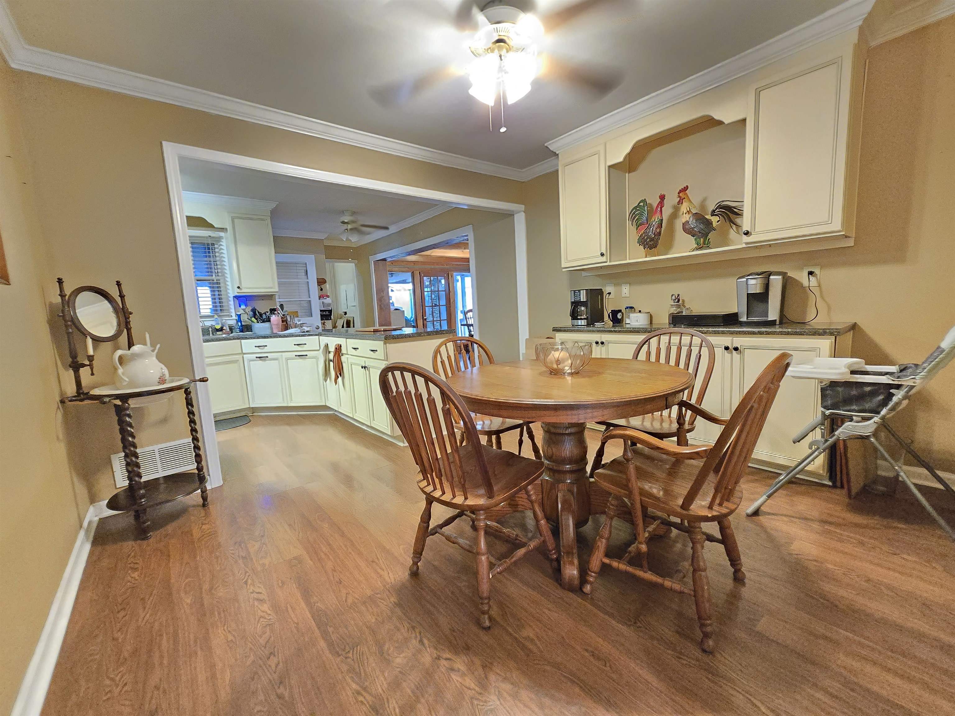 4885 Macon Road Memphis, TN 38122 - Photo 16 of 39 a view of a dining room with furniture and wooden floor