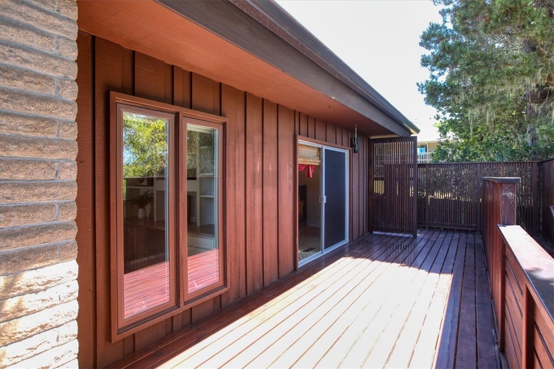 798 Drake Street Cambria, CA 93428 - Photo 20 of 45 a view of backyard with wooden floor and fence
