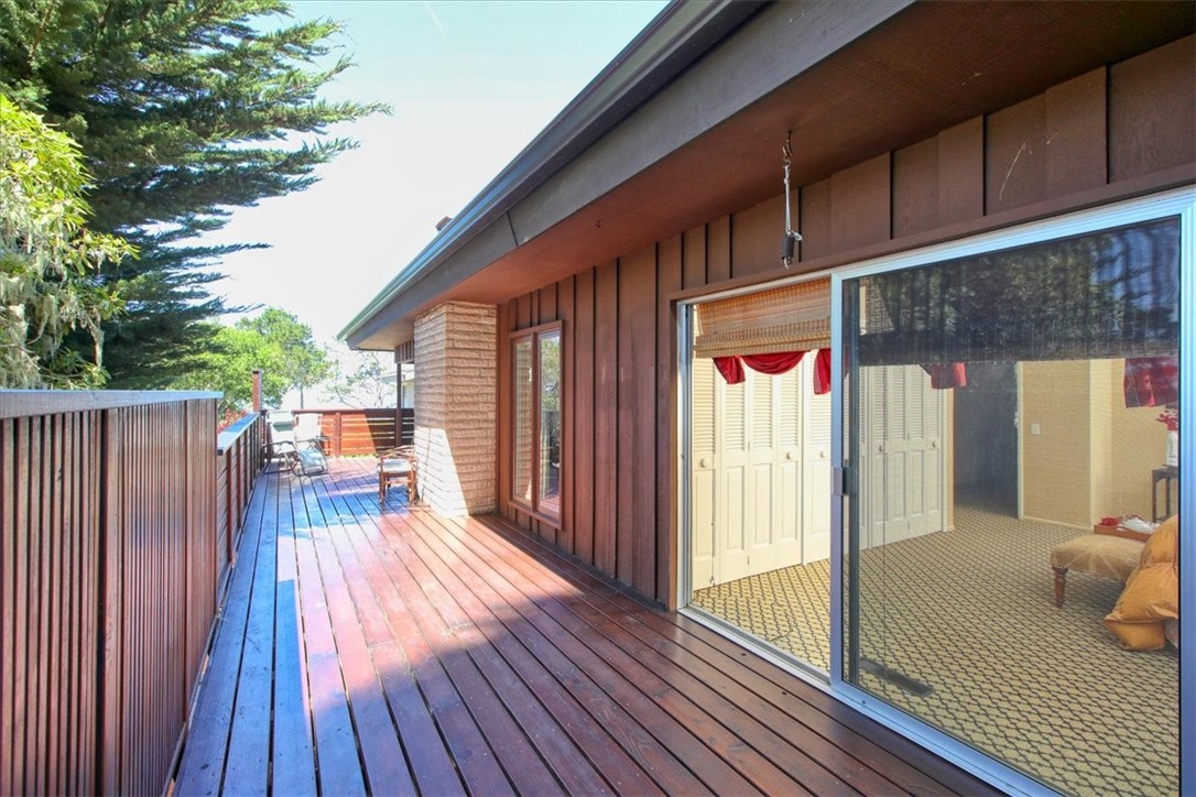 798 Drake Street Cambria, CA 93428 - Photo 21 of 45 a view of balcony with wooden floor and fence