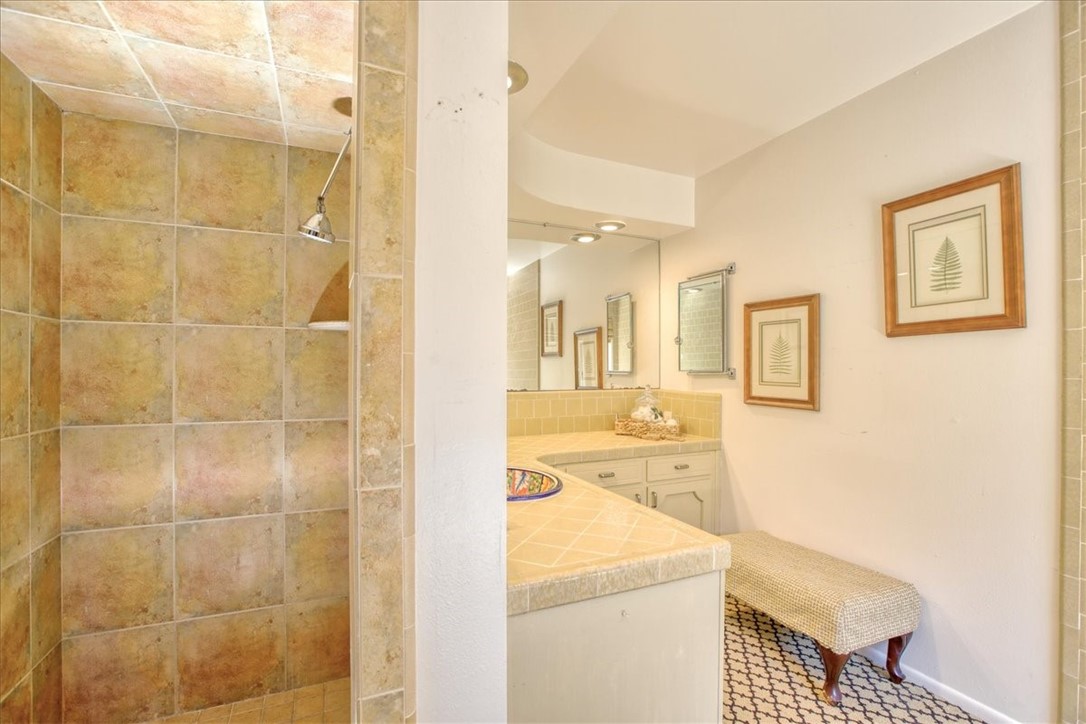 798 Drake Street Cambria, CA 93428 - Photo 25 of 45 a bathroom with a sink a toilet and shower