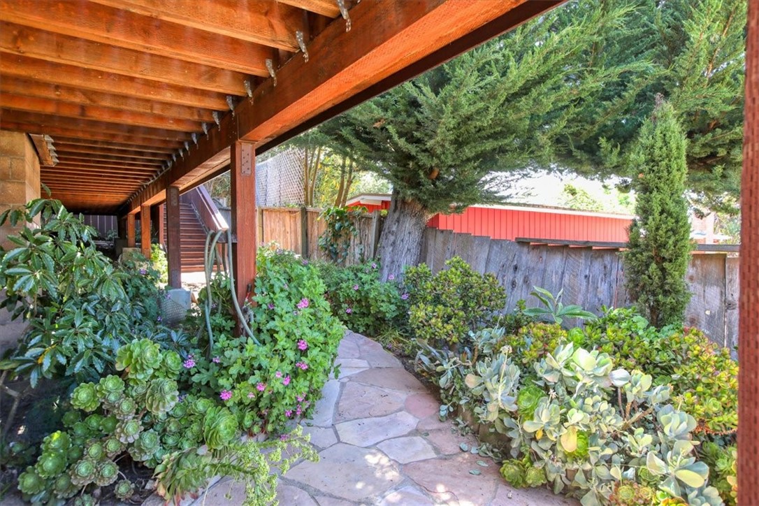 798 Drake Street Cambria, CA 93428 - Photo 39 of 45 a view of a backyard with plants