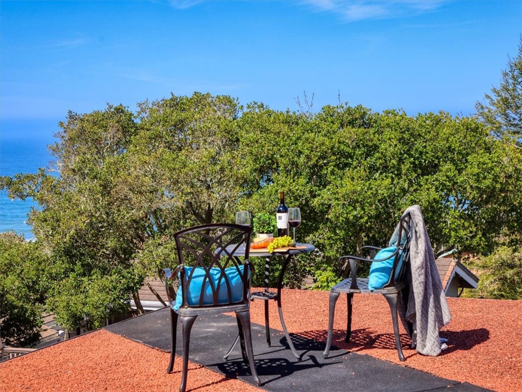 798 Drake Street Cambria, CA 93428 - Photo 42 of 45 a view of a chairs and table in patio