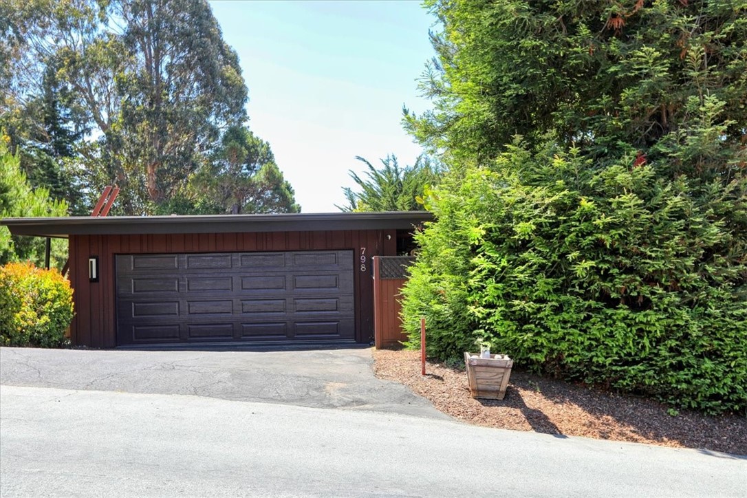798 Drake Street Cambria, CA 93428 - Photo 45 of 45 a front view of a house with a garage