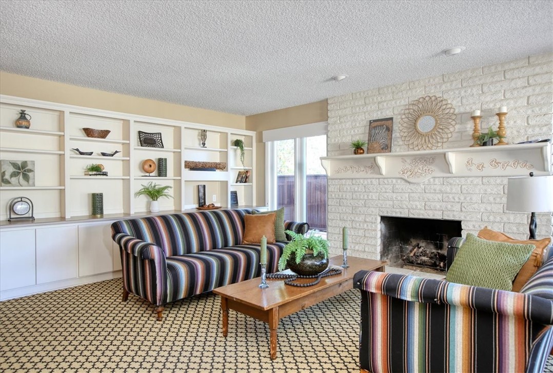 798 Drake Street Cambria, CA 93428 - Photo 7 of 45 a living room with furniture and a fireplace