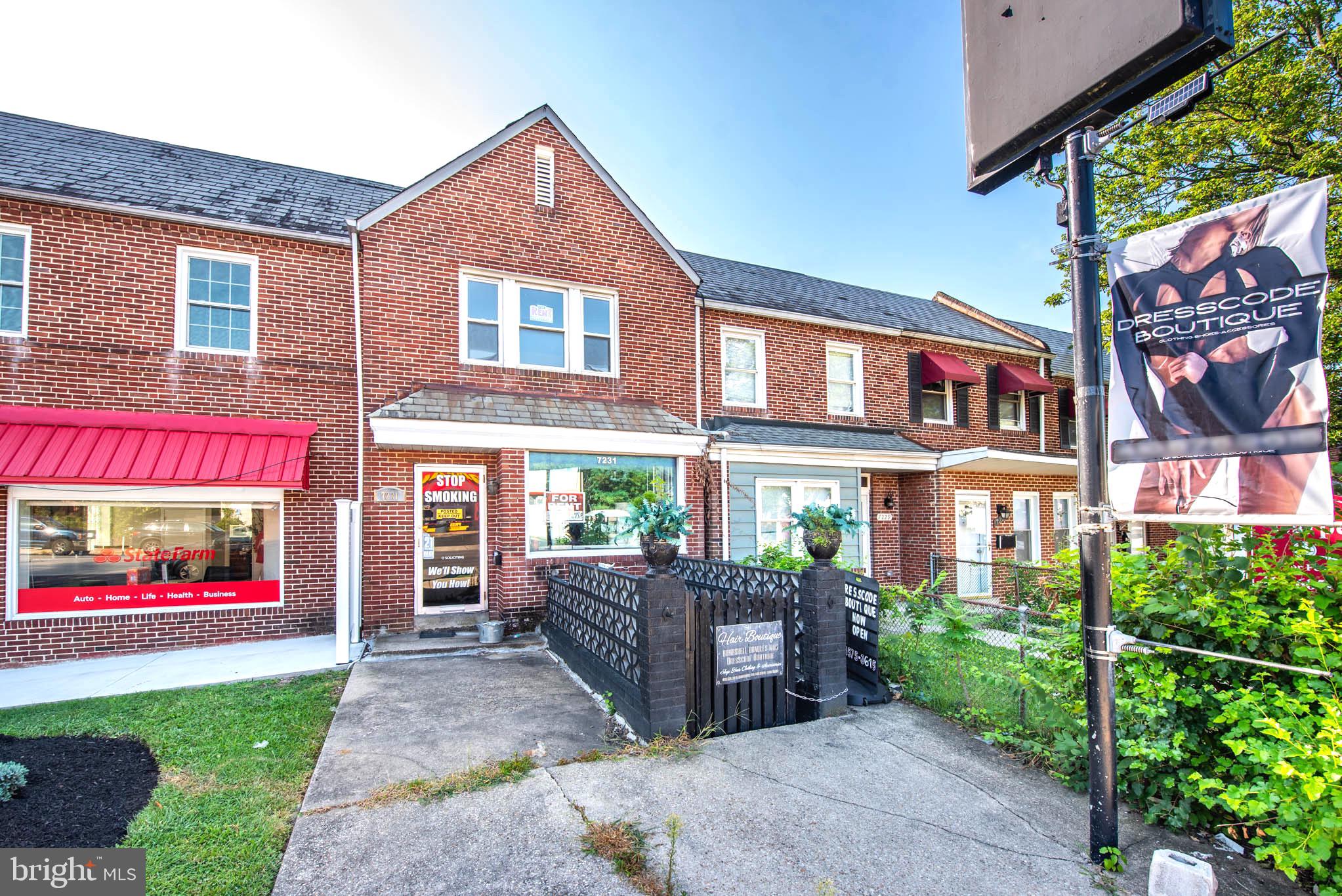 7231 Harford Road Baltimore, MD 21234 - Photo 1 of 21 a view of a brick building next to a yard