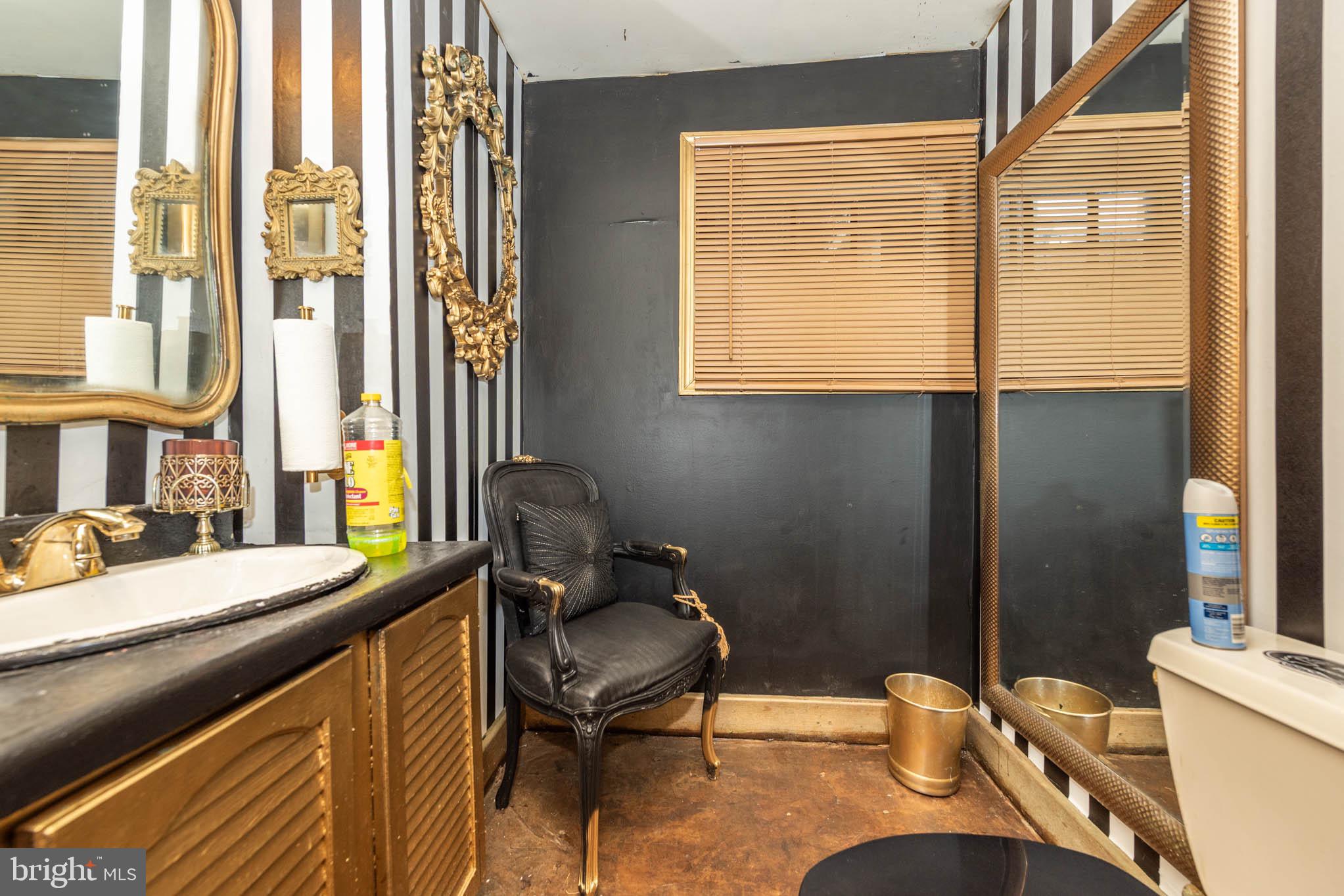 7231 Harford Road Baltimore, MD 21234 - Photo 15 of 21 a room with furniture and windows