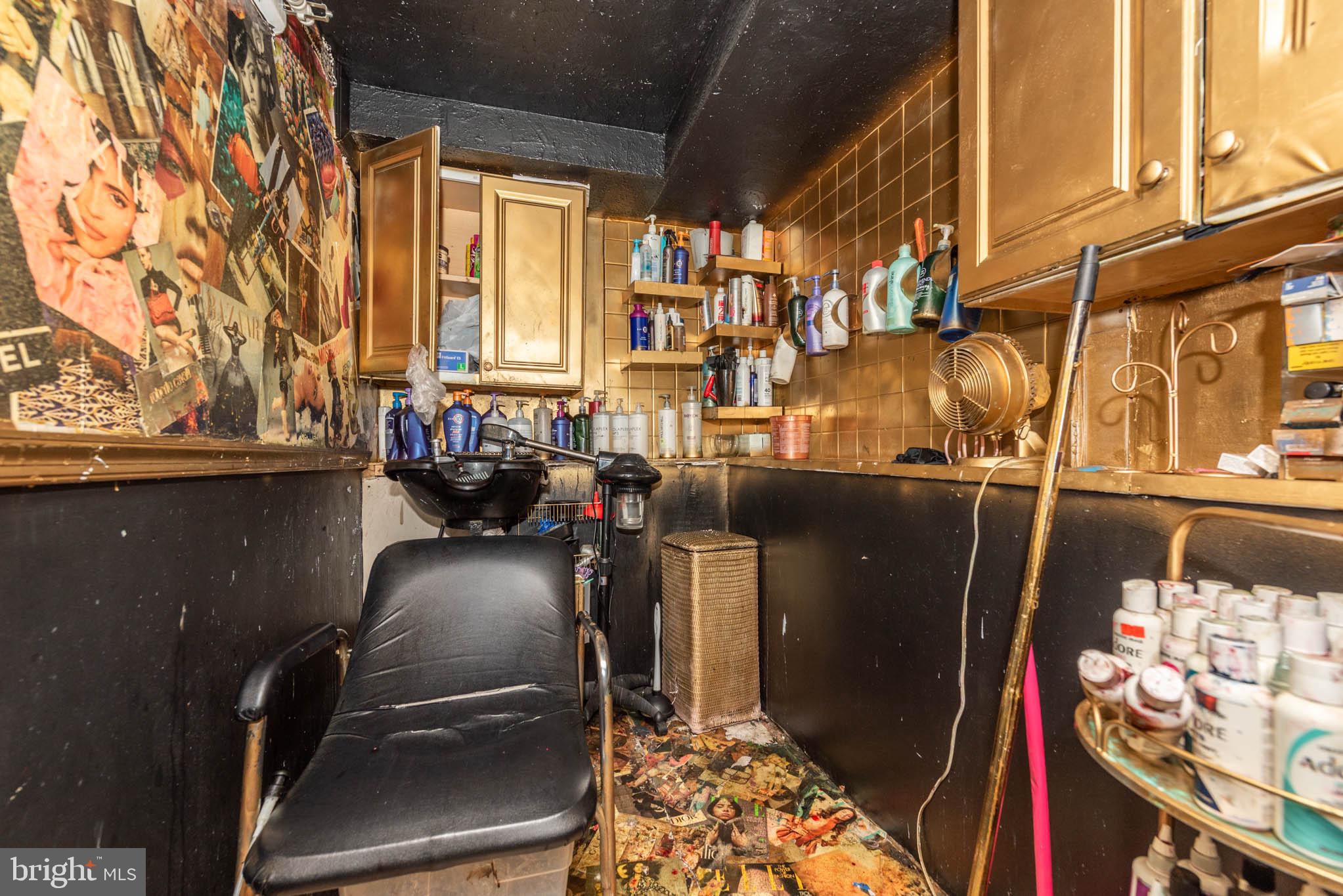 7231 Harford Road Baltimore, MD 21234 - Photo 16 of 21 a room with lots of furniture and windows