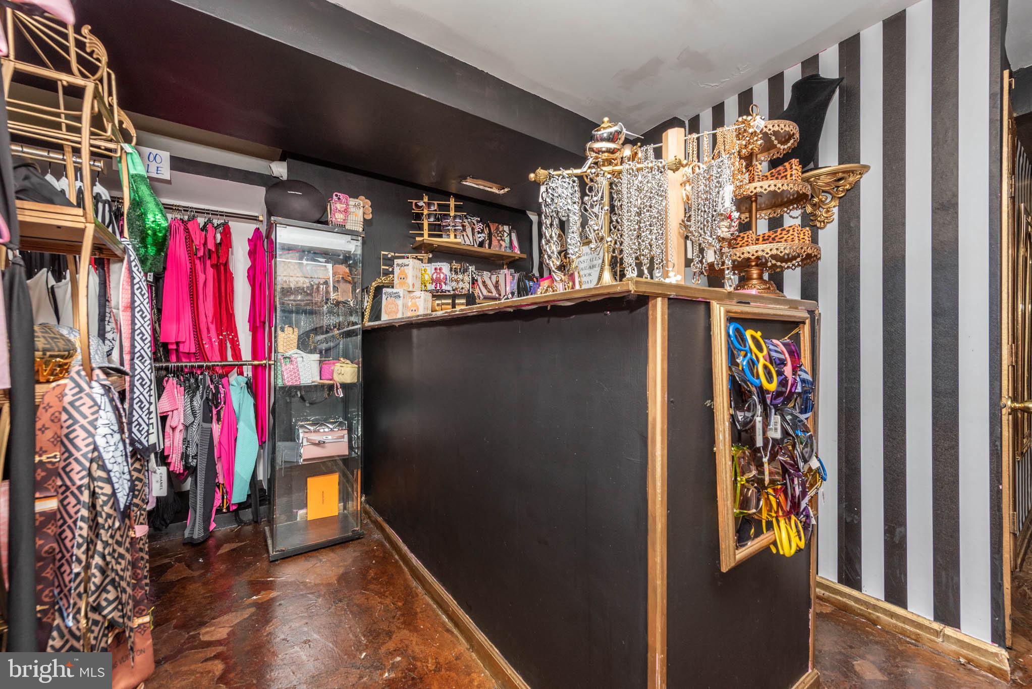 7231 Harford Road Baltimore, MD 21234 - Photo 20 of 21 a view of walk in closet with clothes and shoes