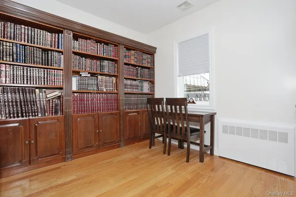 a view of a workspace with furniture