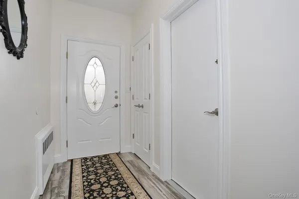 a view of a room with rack on the wall